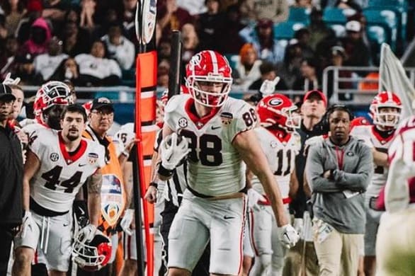 Georgia TE, Pearce Spurlin catches a ball against Florida State in the Orange Bowl / UGAA